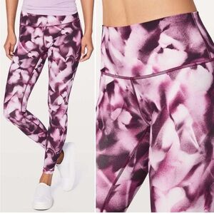 Lululemon wunder under train times Purple Patterned Leggings size 10